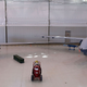 The original Predator drone left, now retired from U.S. military service, with the larger Reaper drone on the right.